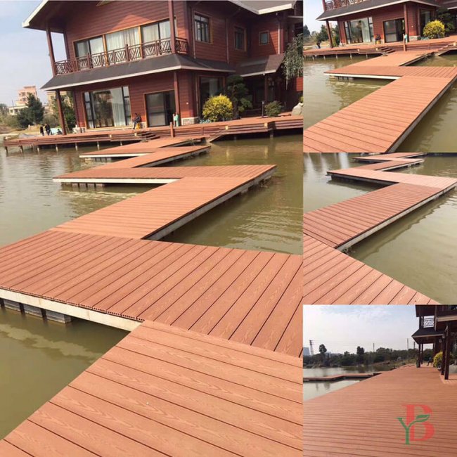 Multi-level composite decking installation in redwood color, showing architectural integration