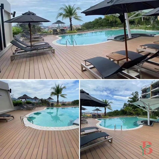 WPC pool deck area with water proof capped composite decking, showcasing the material's water-resistant properties