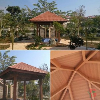 Traditional style composite gazebo in residential garden
