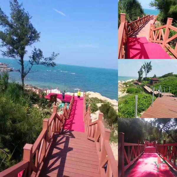 Capped composite deck coastal boardwalk with safety railings, showing scenic ocean views