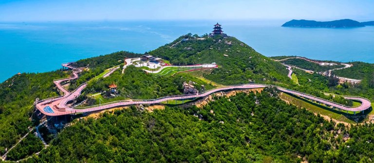 Coastal WPC Deck Aerial view of a coastal WPC deck walkway winding along mountainous shoreline