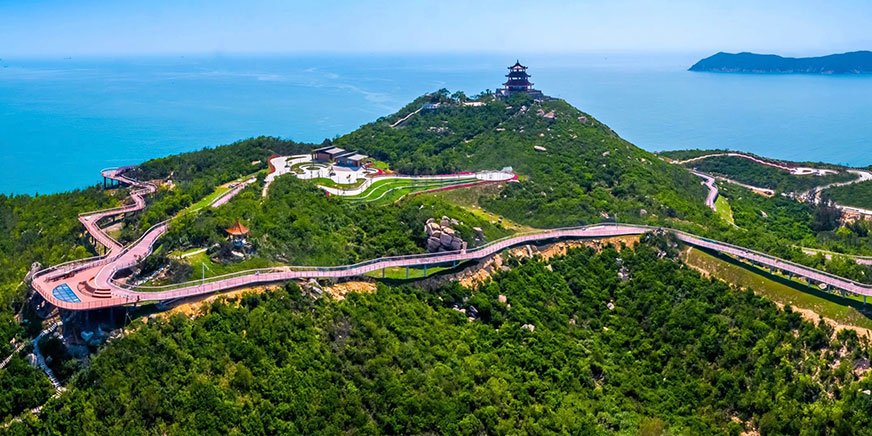 Coastal WPC Deck Aerial view of a coastal WPC deck walkway winding along mountainous shoreline