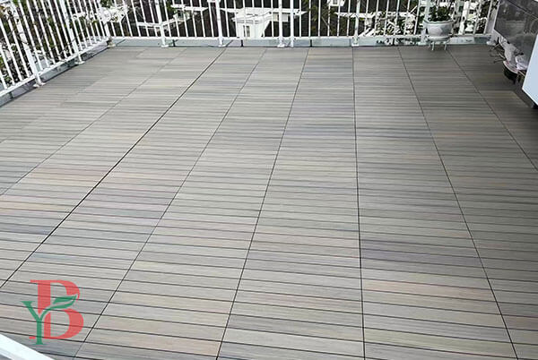 Modular WPC materials in contemporary patio design. Showcases easy-to-install tile pattern layout perfect for DIY applications