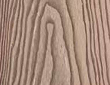 3D Embossed WPC decking in redwood mountain grain finish