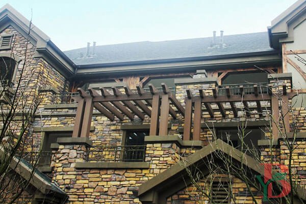 Bongywood balcony WPC pergola, offering both practical shade and aesthetic appeal to a building’s facade.