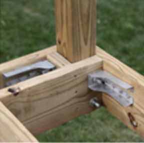 Add bracing around corner posts using the same joist material for maximum stability.