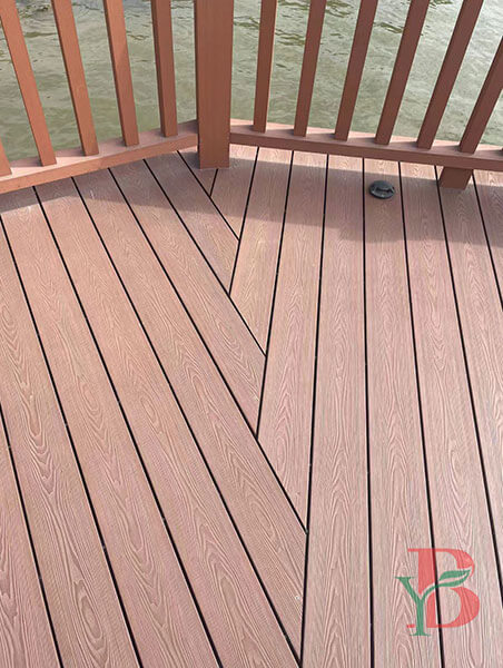 Installation of slip-resistant 3D embossed composite decking around a pool for a safe and beautiful platform