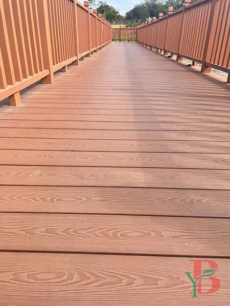 Commercial boardwalk using highly durable 3D embossed WPC decking for heavy foot traffic