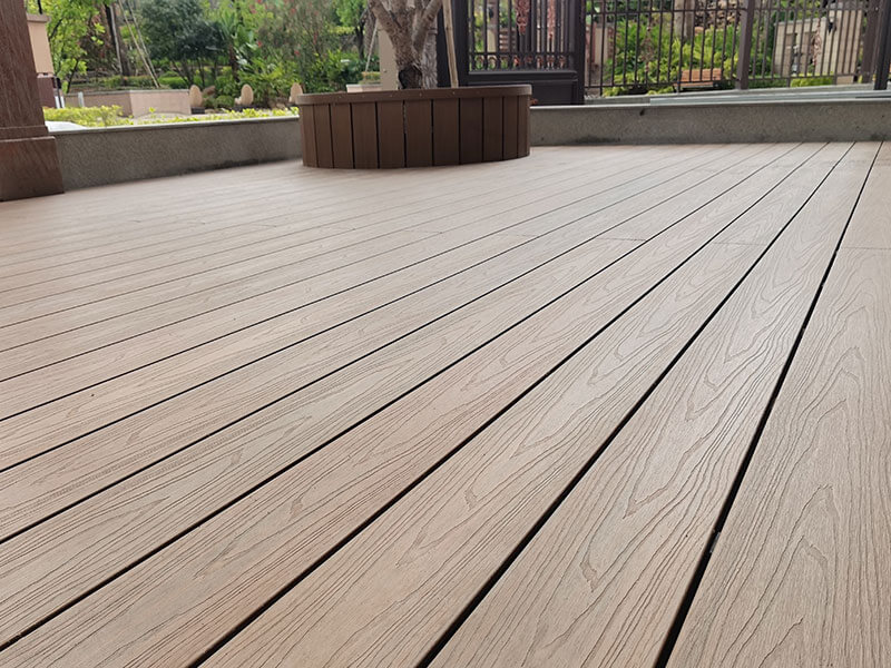 close view of wood grain capped composite decking
