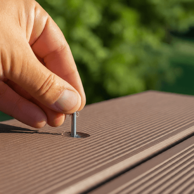 Face Screws composite decking installation1 Installing a metal pin fastener into composite decking