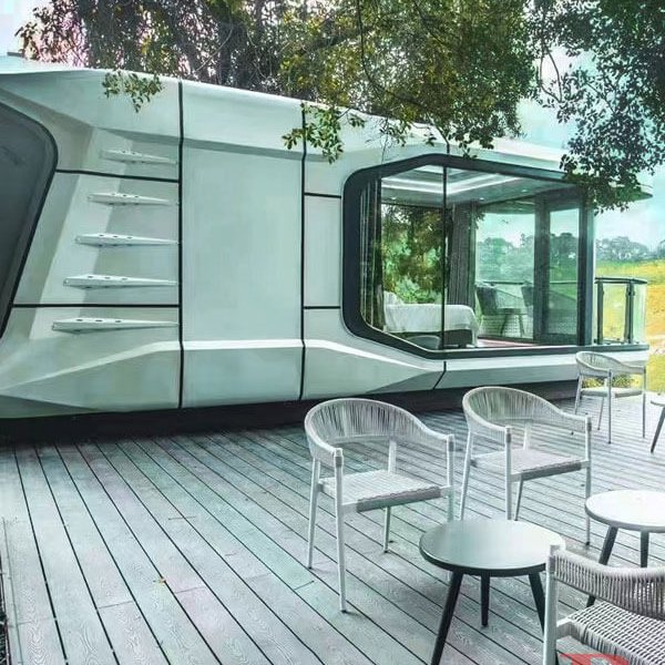 Sleek 3D embossed WPC decking on a contemporary home patio with minimalist furniture and panoramic views, ideal for modern outdoor living