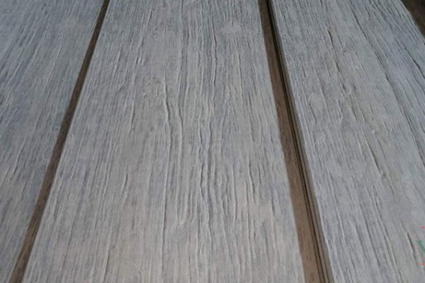 Old Bark 3D Embossed WPC decking installed on an elegant patio