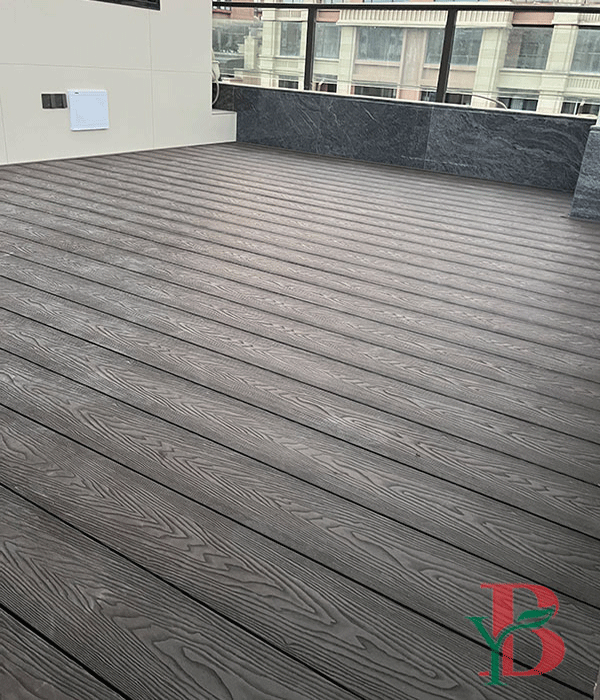 Spacious commercial terrace paved with durable grey WPC decking