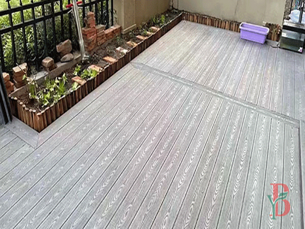 Residential backyard patio with teak color 3D Embossed WPC decking