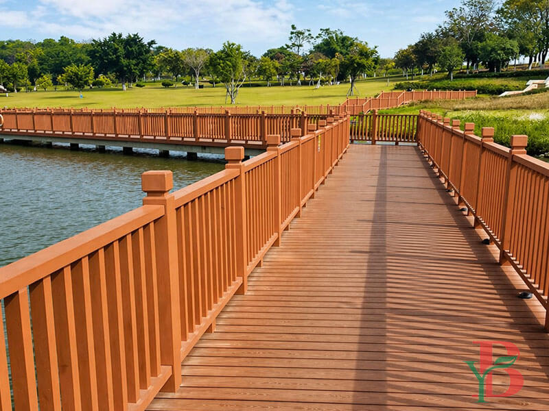 long outdoor boardwalk built with redwood 3D embossed WPC decking boards
