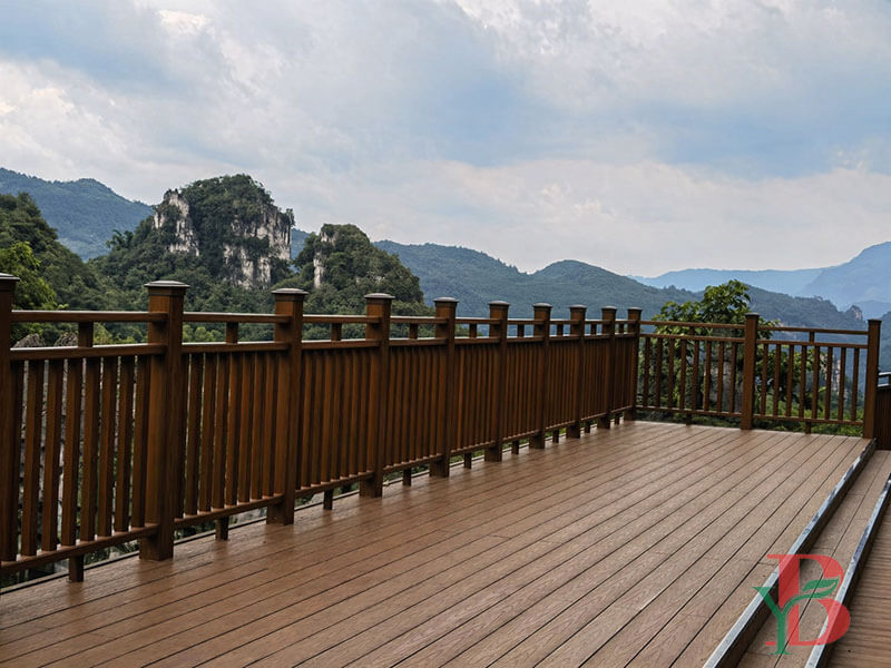 garden and patio decking project using brown 3D embossed WPC decking boards with railing