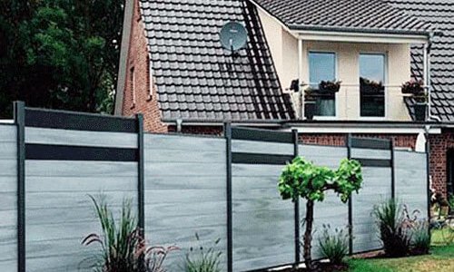 WPC-Fence1 Bongywood WPC fencing system installed around private garden with natural greenery background