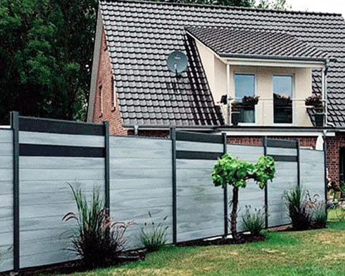 Bongywood WPC fencing system installed around private garden with natural greenery background