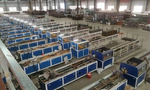 Advanced WPC production lines inside factory showcasing technical innovation and manufacturing capability